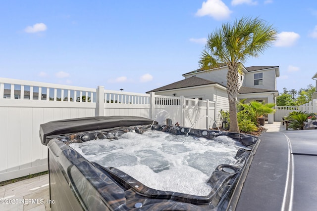 109 Redbud Ln, Yulee, FL 32097 - exterior space with a fenced backyard and a hot tub