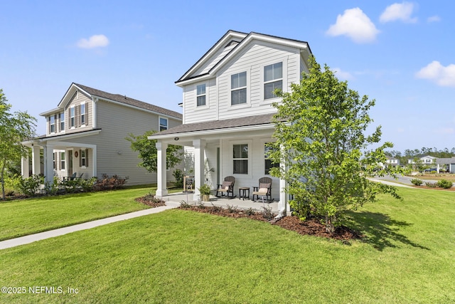 109 Redbud Ln, Yulee, FL 32097 - traditional-style house featuring a front lawn