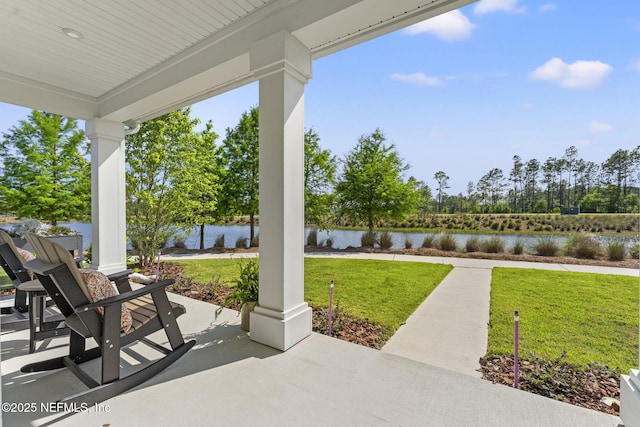 109 Redbud Ln, Yulee, FL 32097 - view of patio / terrace with a porch and a water view