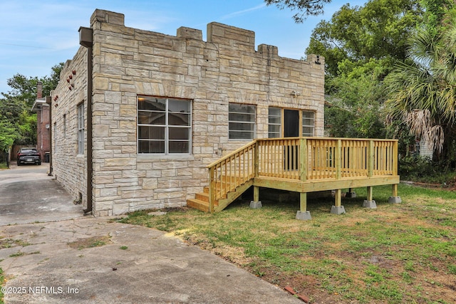 2578 Haldumar Ter, Jacksonville, FL 32204 - rear view of property featuring a deck and stone siding
