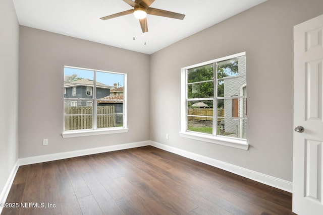 2578 Haldumar Ter, Jacksonville, FL 32204 - spare room featuring plenty of natural light, baseboards, and dark wood finished floors
