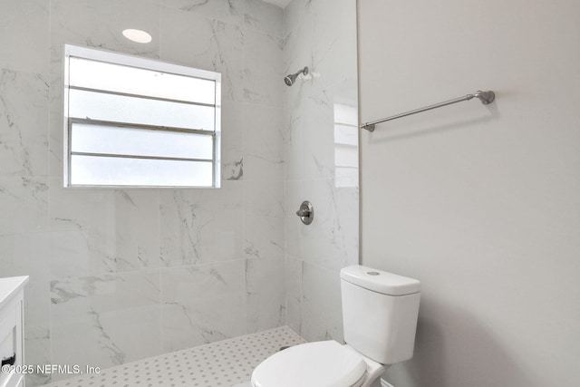 2578 Haldumar Ter, Jacksonville, FL 32204 - bathroom with vanity, a stall shower, and toilet