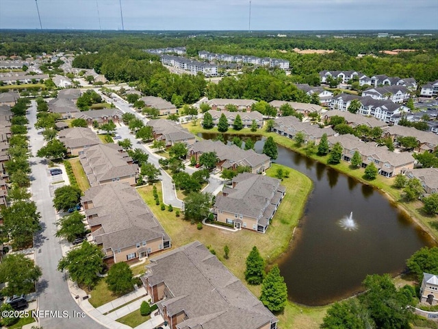 birds eye view of property featuring a residential view and a water view