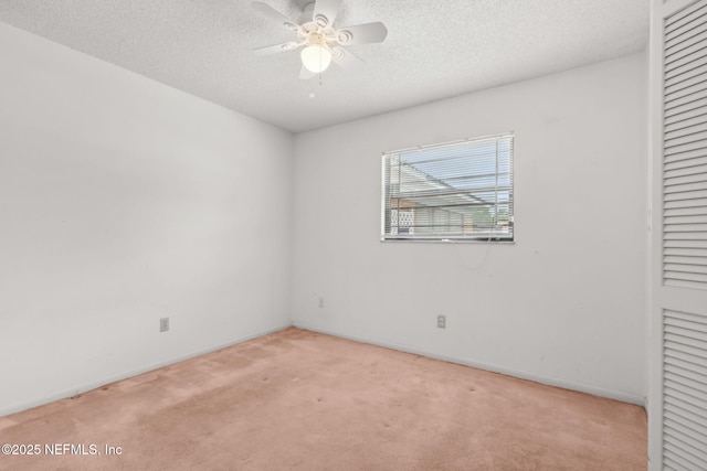 unfurnished bedroom featuring baseboards, carpet, a closet, and a textured ceiling