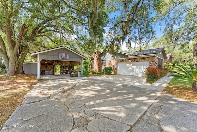 127 Old Jennings Rd, Orange Park, FL 32065 - view of front of home featuring brick siding and concrete driveway
