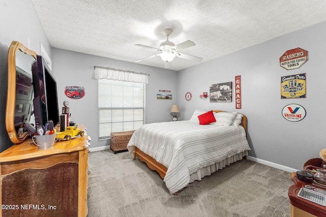 127 Old Jennings Rd, Orange Park, FL 32065 - carpeted bedroom with a textured ceiling, baseboards, and ceiling fan
