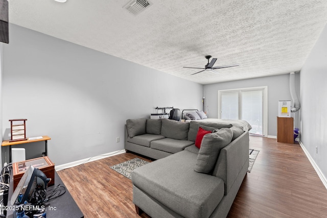 127 Old Jennings Rd, Orange Park, FL 32065 - living area featuring wood finished floors, ceiling fan, a textured ceiling, and visible vents