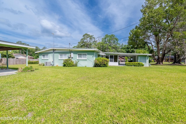 single story home featuring fence, central AC, and a front lawn