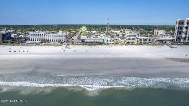 drone / aerial view of extended coastline