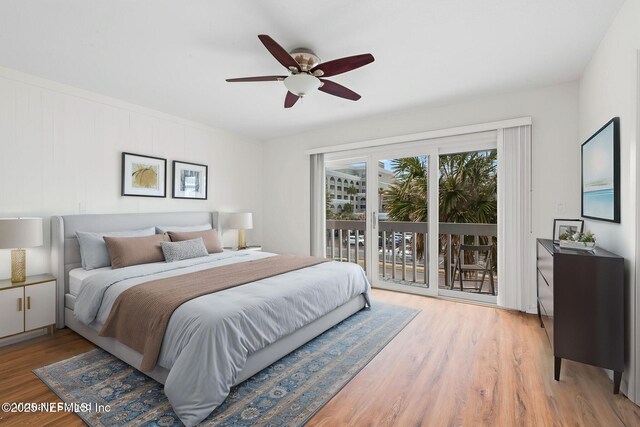 bedroom featuring access to exterior, light wood finished floors, and ceiling fan