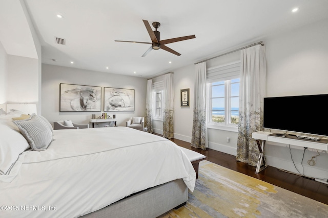 bedroom featuring recessed lighting, baseboards, ceiling fan, and wood finished floors