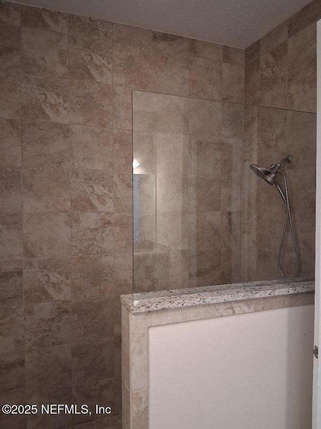 full bath featuring walk in shower