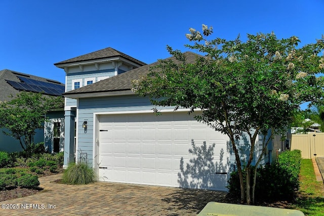 2924 Sea Grape Dr S, Fernandina Beach, FL 32034 - garage with fence and driveway