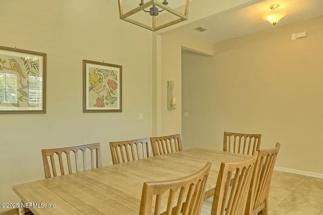 2924 Sea Grape Dr S, Fernandina Beach, FL 32034 - dining space featuring light tile patterned flooring and baseboards