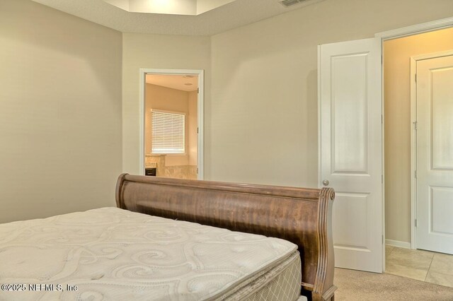 2924 Sea Grape Dr S, Fernandina Beach, FL 32034 - bedroom featuring light colored carpet