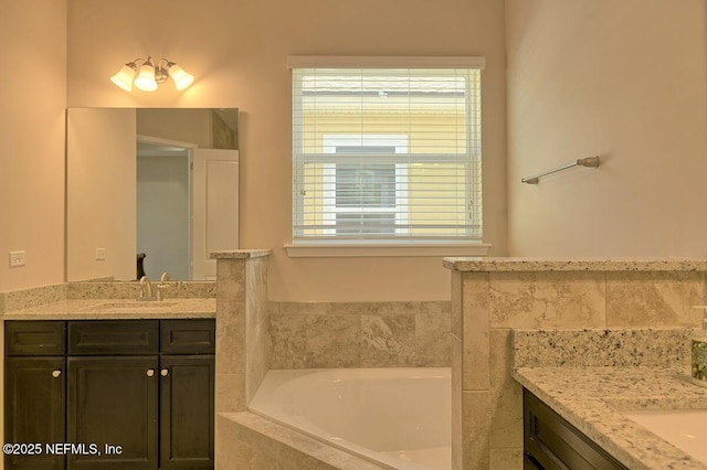 2924 Sea Grape Dr S, Fernandina Beach, FL 32034 - full bathroom with two vanities and a bath