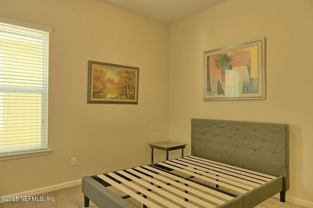 2924 Sea Grape Dr S, Fernandina Beach, FL 32034 - carpeted bedroom featuring baseboards