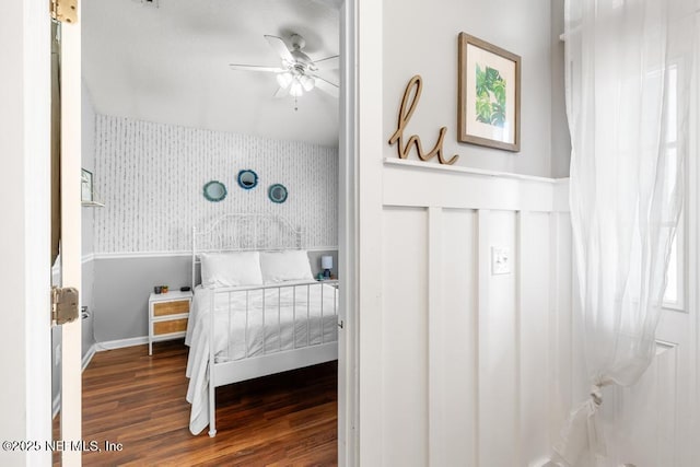 45103 Amhurst Oaks Dr, Callahan, FL 32011 - bedroom with wallpapered walls and wood finished floors
