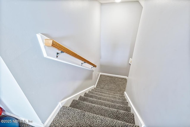 45103 Amhurst Oaks Dr, Callahan, FL 32011 - stairs featuring carpet flooring and baseboards