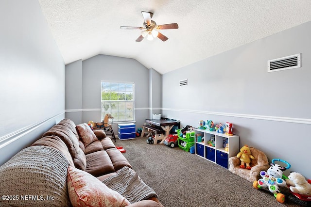 45103 Amhurst Oaks Dr, Callahan, FL 32011 - playroom with carpet flooring, ceiling fan, vaulted ceiling, and a textured ceiling
