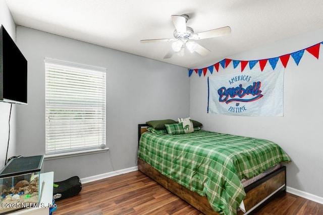 45103 Amhurst Oaks Dr, Callahan, FL 32011 - bedroom featuring wood finished floors, baseboards, and multiple windows