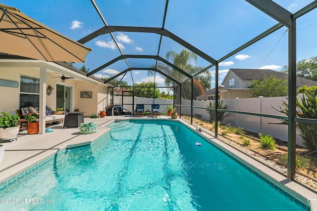 1421 Kipling Ln, Ponte Vedra, FL 32081 - view of pool featuring a patio area, fence, a ceiling fan, and a lanai
