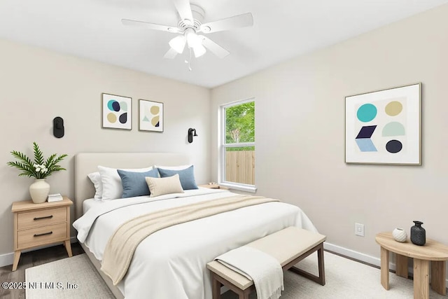 2911 Wilcox St, Jacksonville, FL 32209 - bedroom with baseboards, a ceiling fan, and wood finished floors