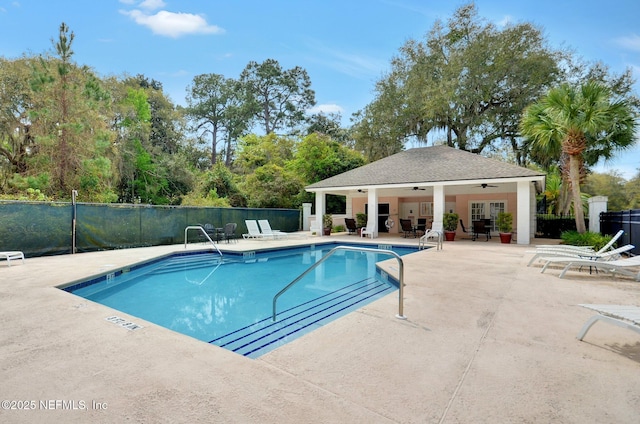 4746 Gulfstream Ct, Fernandina Beach, FL 32034 - community pool with ceiling fan, fence, and a patio area