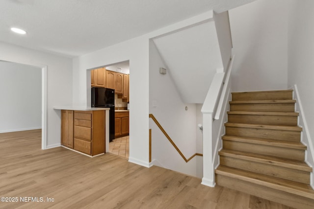 4746 Gulfstream Ct, Fernandina Beach, FL 32034 - staircase featuring recessed lighting, baseboards, and wood finished floors