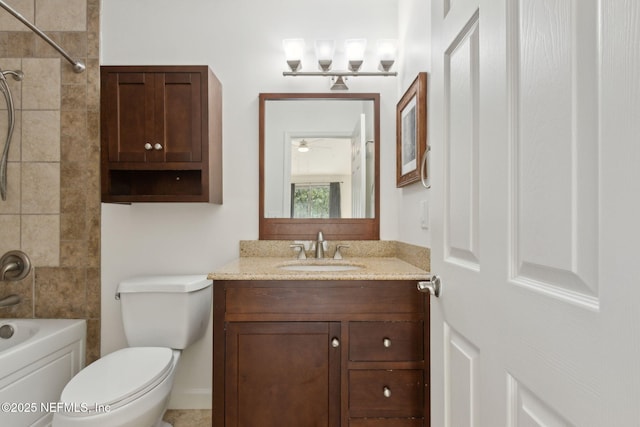 4746 Gulfstream Ct, Fernandina Beach, FL 32034 - full bath with toilet, bathing tub / shower combination, vanity, and a ceiling fan