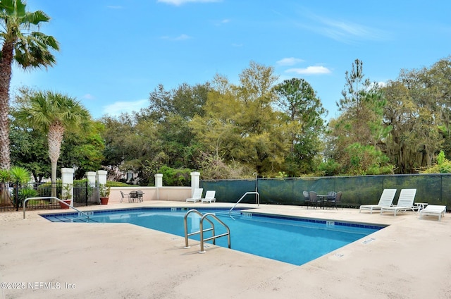 4746 Gulfstream Ct, Fernandina Beach, FL 32034 - community pool with a patio area and fence