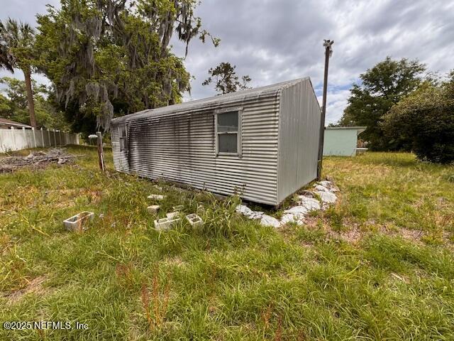 view of outbuilding with an outbuilding