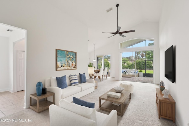 1201 Coghill Cir, Saint Augustine, FL 32092 - living room featuring ceiling fan, light carpet, high vaulted ceiling, baseboards, and visible vents