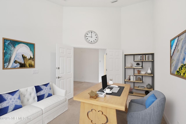 1201 Coghill Cir, Saint Augustine, FL 32092 - office area with baseboards, light colored carpet, and a towering ceiling