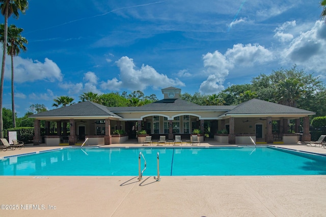 pool featuring a patio and a ceiling fan