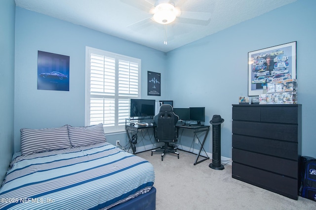 bedroom featuring carpet floors, baseboards, and ceiling fan