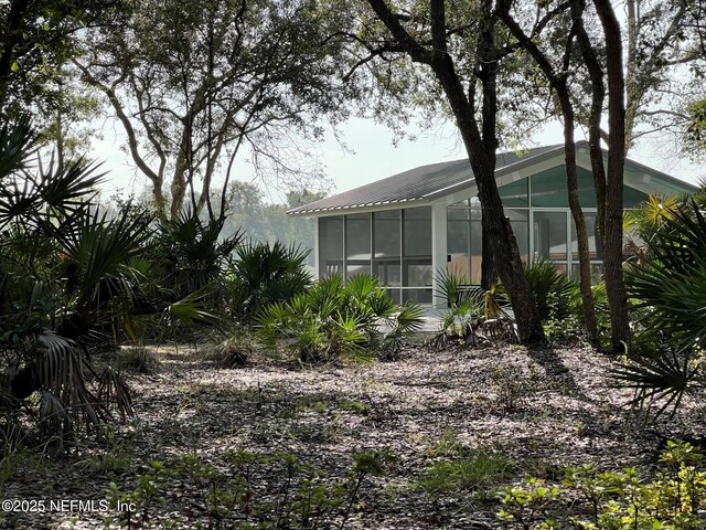 655 Juniper Hills Dr, Saint Johns, FL 32259 - view of yard featuring a sunroom