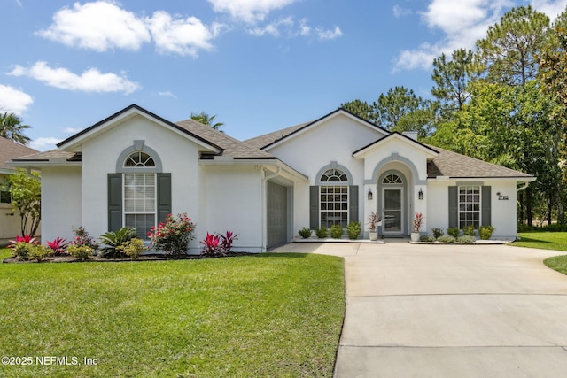 ranch-style home featuring an attached garage, stucco siding, concrete driveway, and a front yard