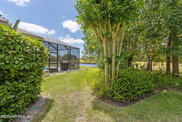 view of yard with a lanai