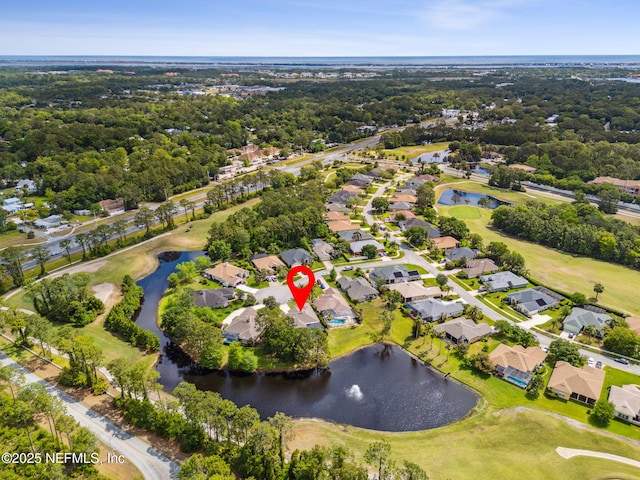 bird's eye view featuring a water view, a residential view, and golf course view