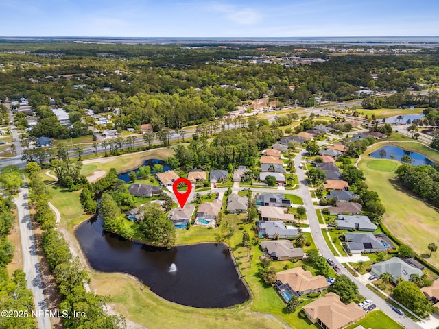 bird's eye view with a water view, golf course view, and a residential view
