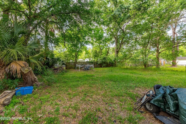 view of yard with fence