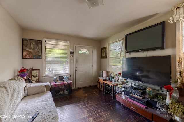 living area with hardwood / wood-style floors