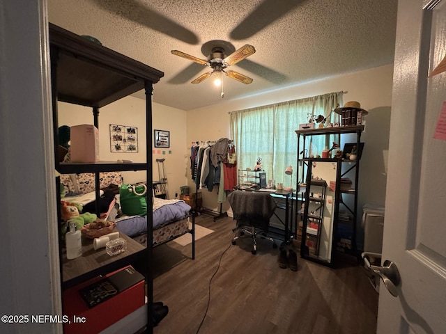 1559 Beecher Ln, Orange Park, FL 32073 - bedroom with ceiling fan, a textured ceiling, and wood finished floors