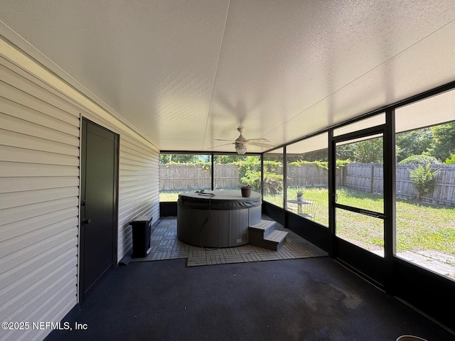 1559 Beecher Ln, Orange Park, FL 32073 - sunroom / solarium featuring plenty of natural light, a ceiling fan, and a jacuzzi