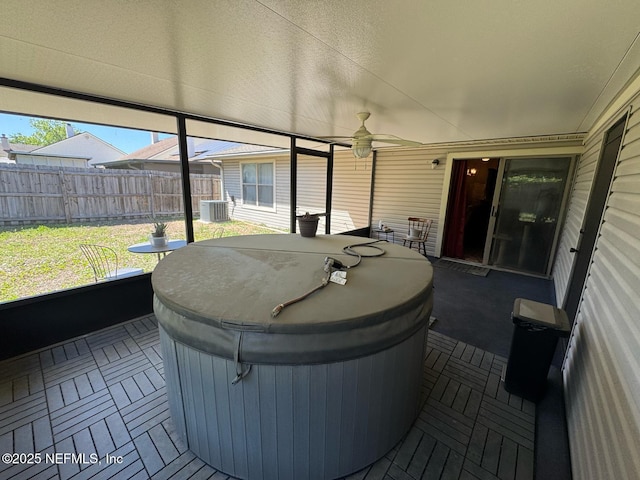 1559 Beecher Ln, Orange Park, FL 32073 - sunroom / solarium featuring ceiling fan and a hot tub