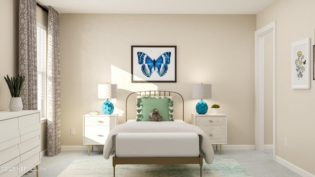 carpeted bedroom with baseboards