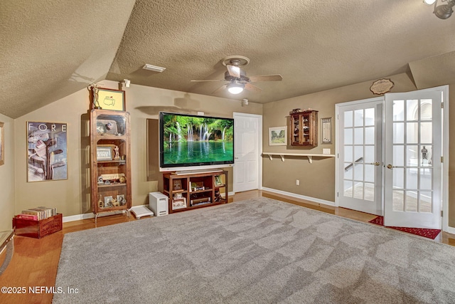 3277 Sequoyah Cir, Saint Johns, FL 32259 - cinema room with baseboards, a ceiling fan, a textured ceiling, and wood finished floors