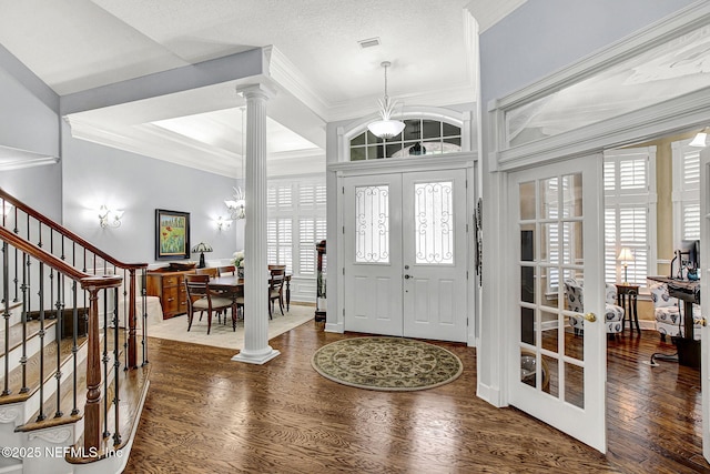 3277 Sequoyah Cir, Saint Johns, FL 32259 - entryway with ornamental molding, decorative columns, wood finished floors, and visible vents