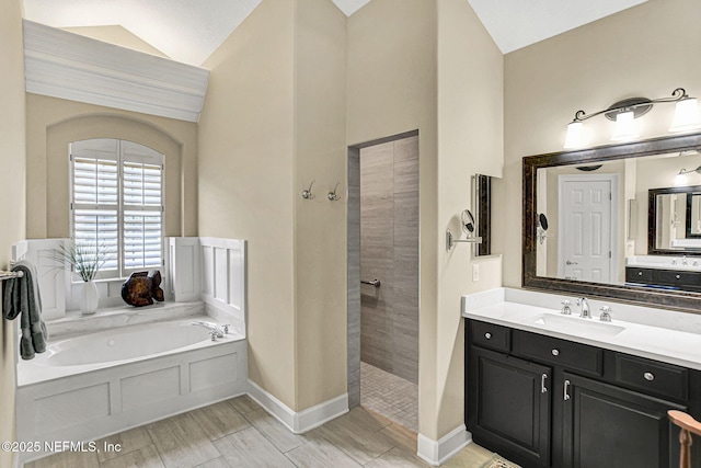 3277 Sequoyah Cir, Saint Johns, FL 32259 - bathroom featuring vanity, baseboards, a walk in shower, a bath, and vaulted ceiling